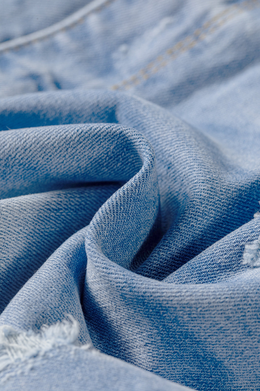 Sail Blue Asymmetric Raw Hem Distressed Whiskery Denim Shorts